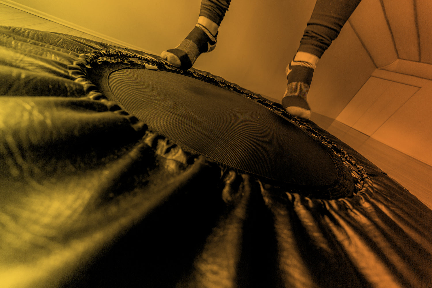 Feet in Mid Air 1 with Yellow and Orange Gradient Cellercise