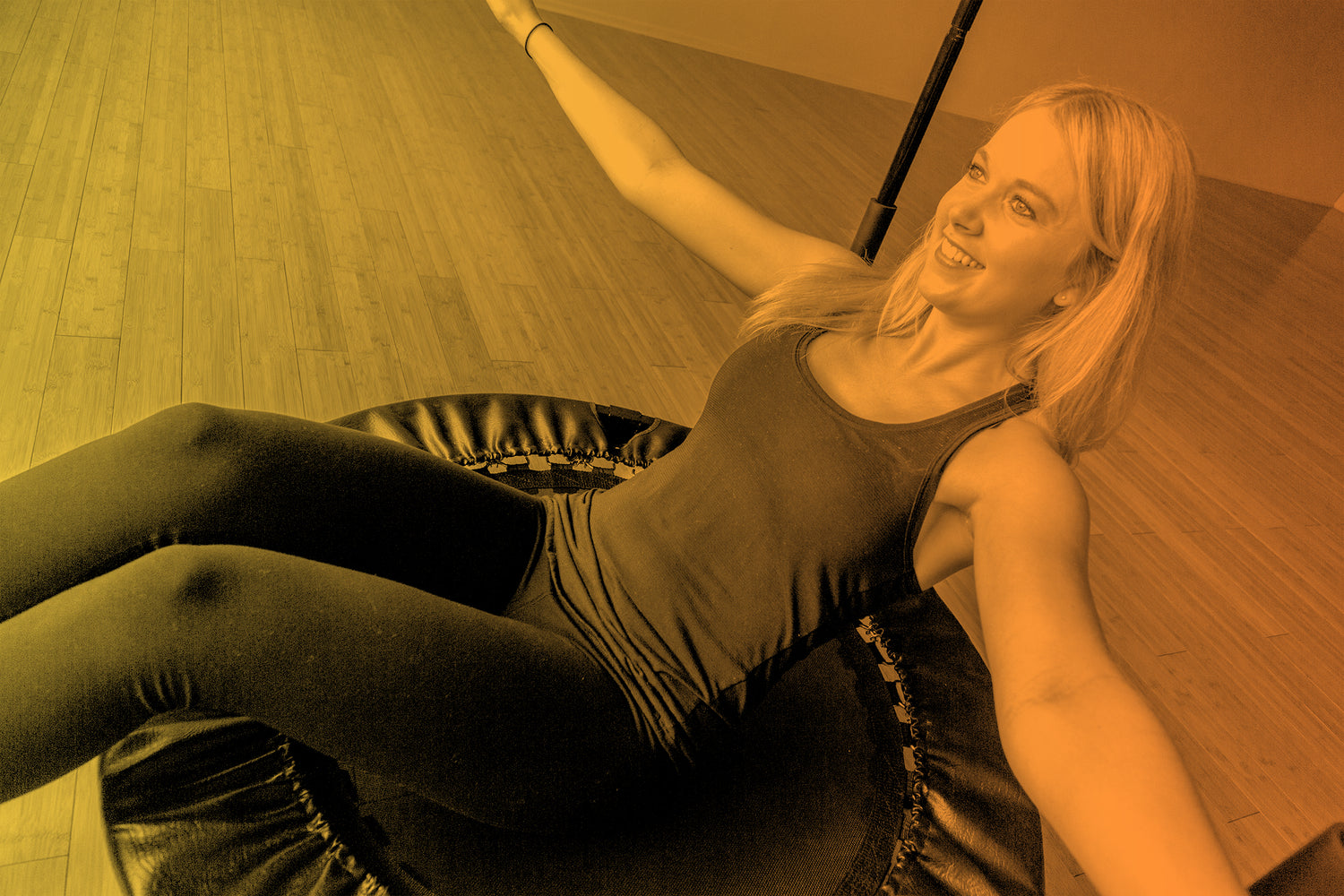 Sit and Bounce 2 Arms Outstretched with Yellow and Orange Gradient Cellercise