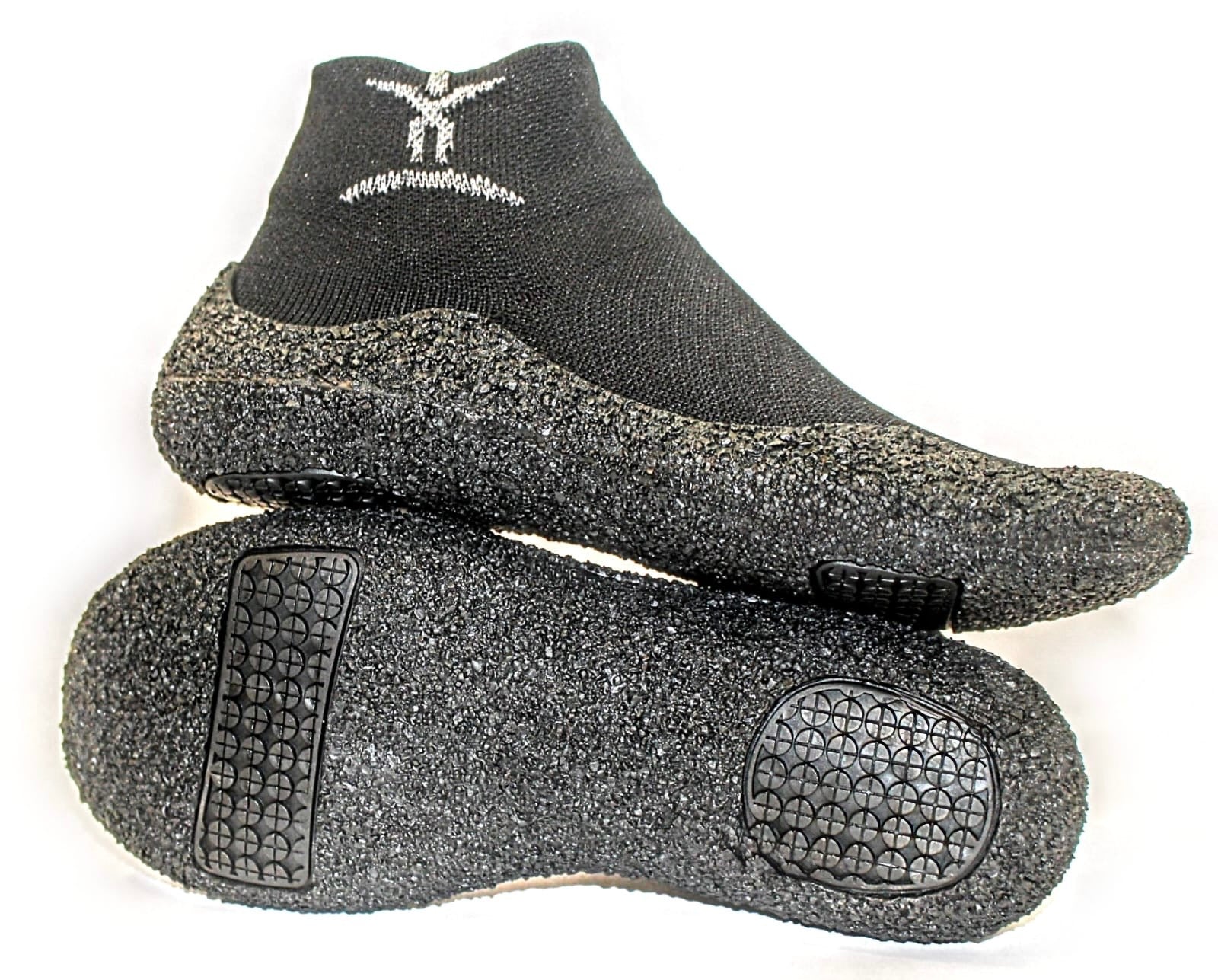 A pair of black CelliSole rebounder shoes with textured soles