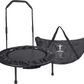 A black bi-fold Cellerciser rebounder with a balance bar, along with its carrying case